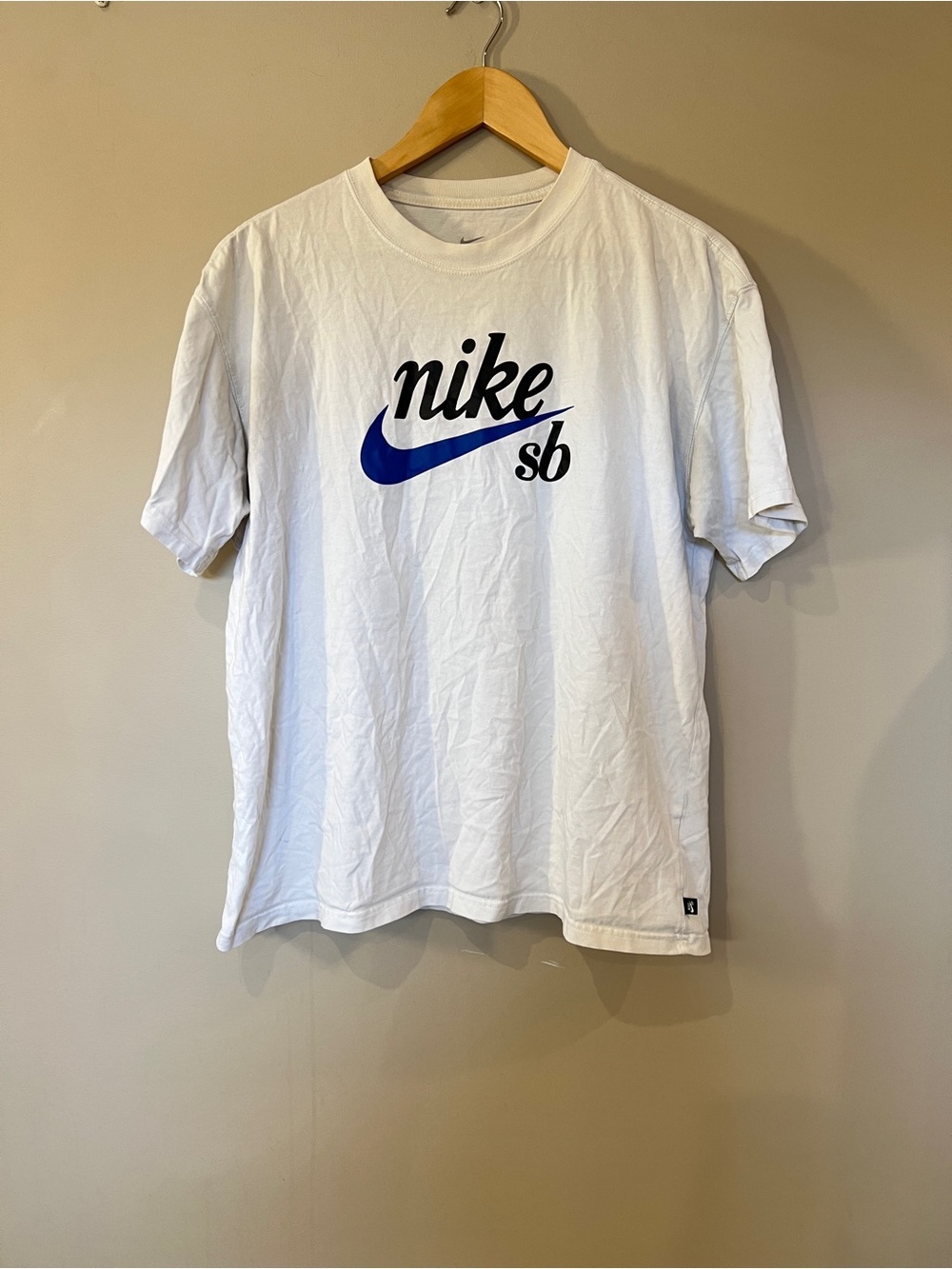 Nike SB White Short Sleeve Logo Tee with Blue Swoosh
